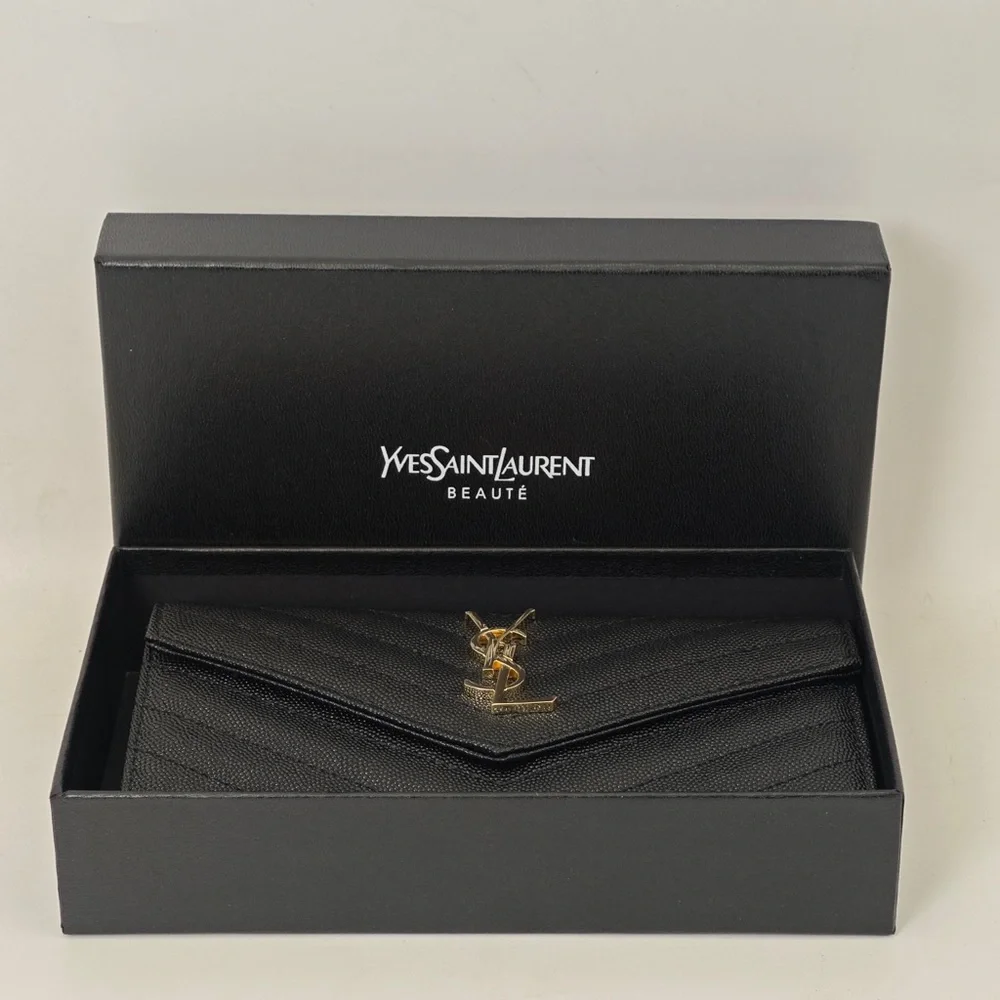 Yves Saint Laurent Quilted Black Clutch with Gold Accent